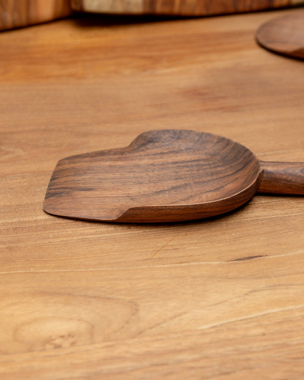 Wooden spatula on a wooden surface