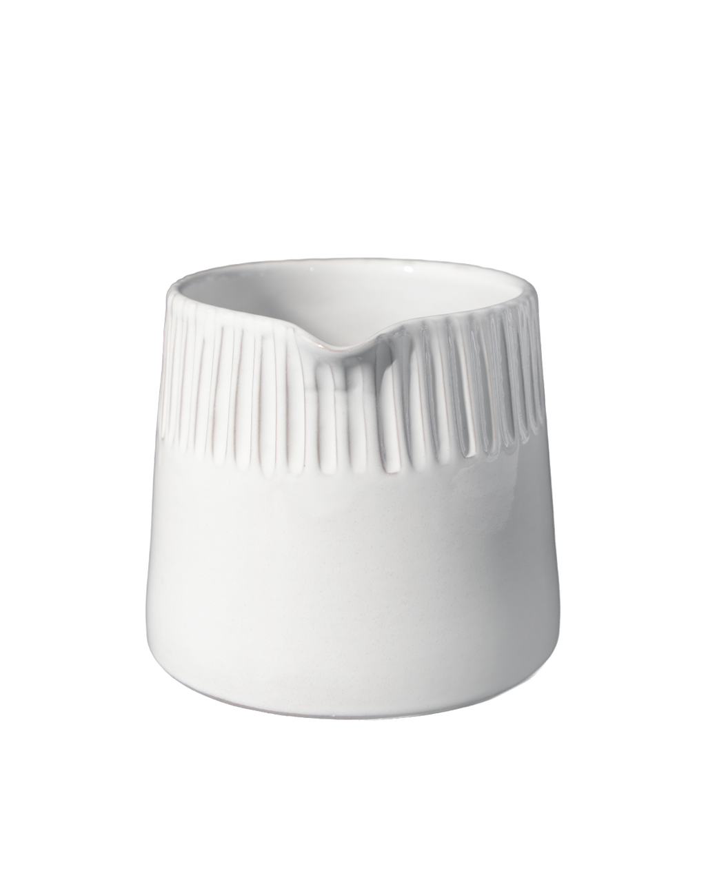 White ceramic pitcher with ribbed design on a white background