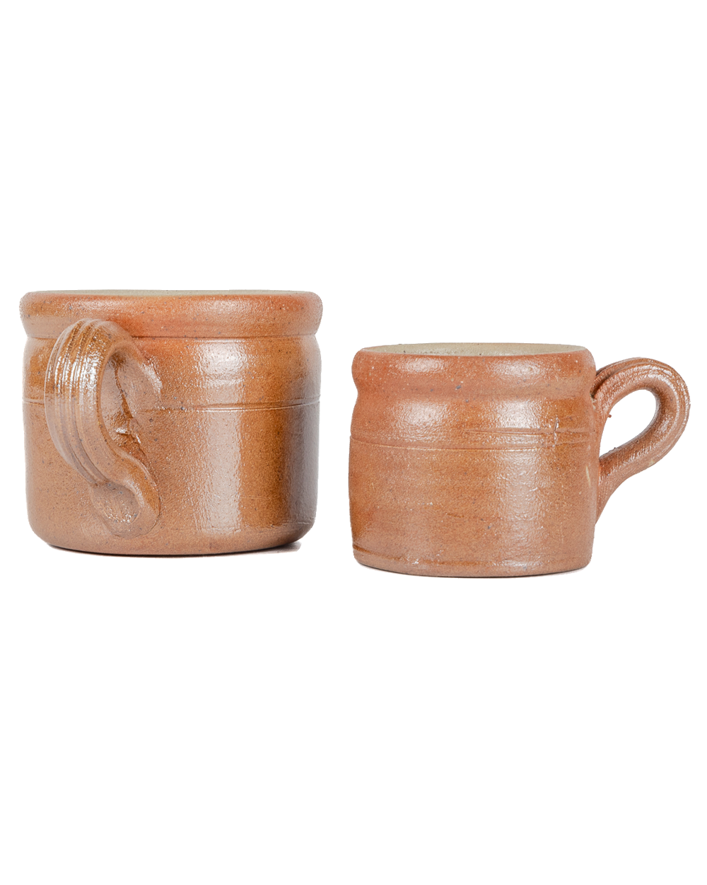 Two terracotta mugs on a white background