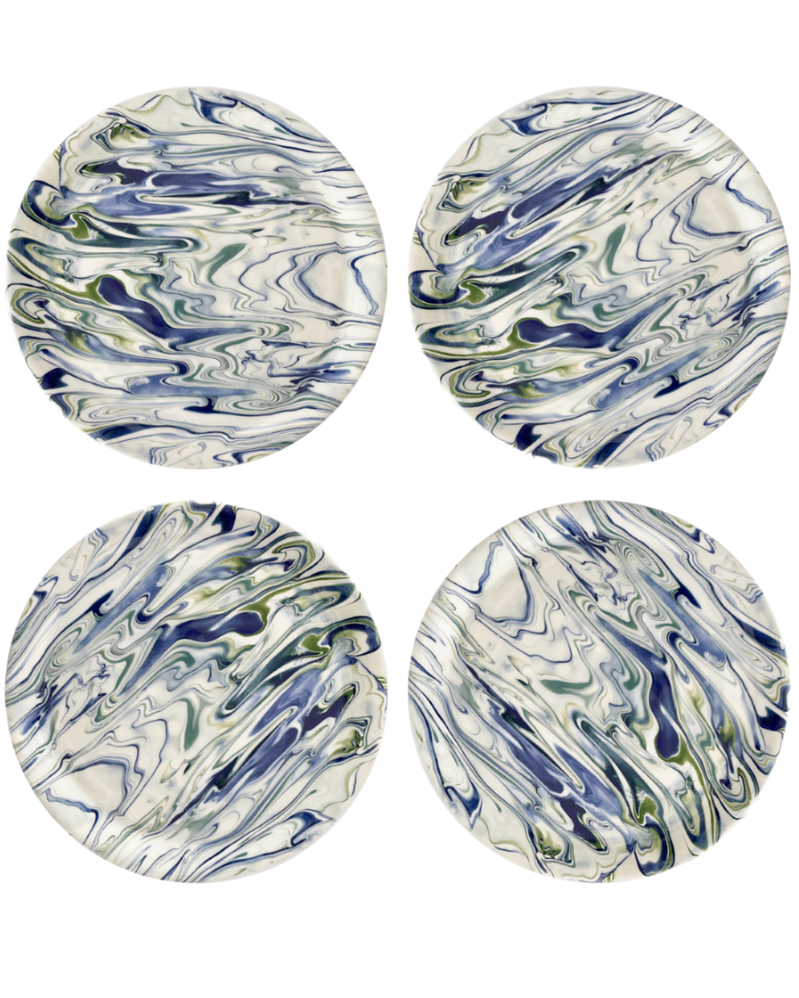 Four round marbled coasters with blue and green patterns on a white background