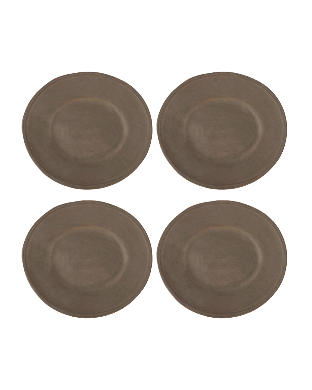 Four brown ceramic plates on a white background